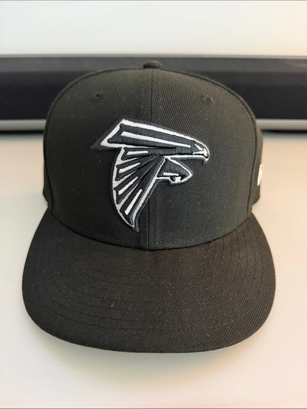 New Era Black Hat with Atlanta Falcons Logo 7 1/4 Inch